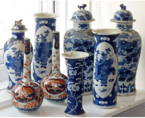 A selection of Oriental ceramic Vases to include a pair of 19th Century Japanese Bottle Vases hand decorated in the Imari pal