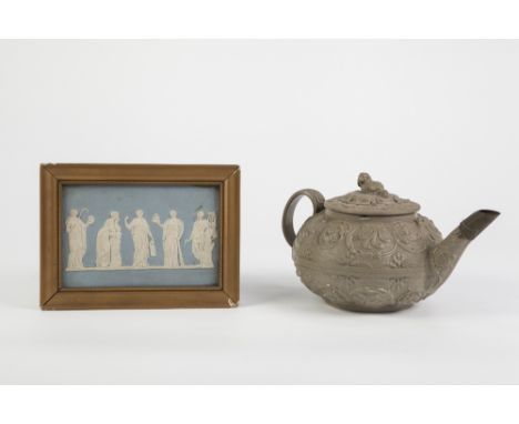 LATE EIGHTEENTH CENTURY WEDGWOOD MOULDED OLIVE GREEN JASPERWARE POTTERY TEAPOT, decorated with two bands of open foliate scro