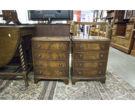 TWO SMALL GEORGIAN STYLE BOW FRONTED MAHOGANY FOUR DRAWER PEDESTALS, WITH BRACKET FEET AND RING HANDLES (2) 