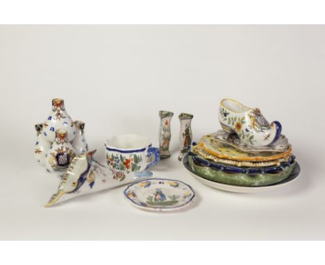 TWELVE PIECES OF EARLY TWENTIETH CENTURY FRENCH FAIENCE POTTERY, including; five pieces signed Henriot Quimper CUP AND SAUCER