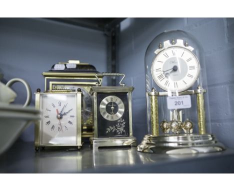 AN ANNIVERSARY CLOCK UNDER DOME AND THREE OTHER MANTEL CLOCKS (4) 