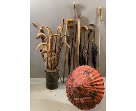 WALKING STICKS, UMBRELLAS, a large quantity in a large 'flask'