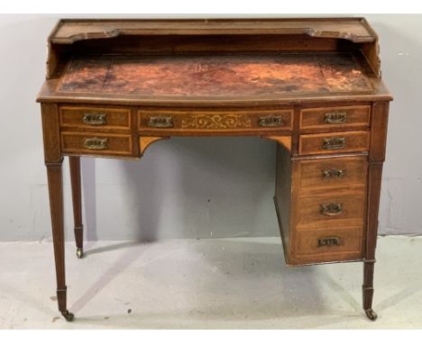 CROSSBANDED &amp; INLAID MAHOGANY REGENCY STYLE KNEEHOLE DESK with leather tooled top, upper shelf, five front opening drawer