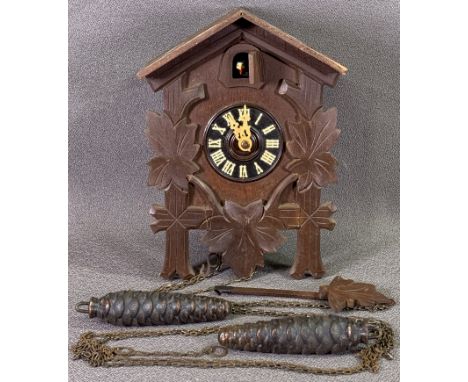 BLACK FOREST TYPE CUCKOO CLOCK with twin pine cone weights, 23 x 16cms