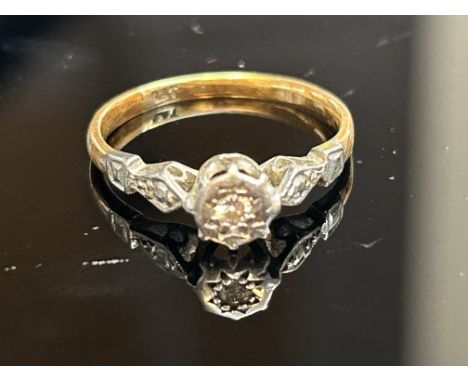 Diamond ring set in platinum with yellow metal band possibly 18ct weight 2g Size I
