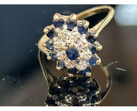 9ct Gold ring set with diamond & sapphires Weight 2.2g Size M.5 