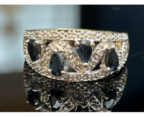 9ct Gold ring set with diamonds & possible sapphires Size Q.5 4.1g 