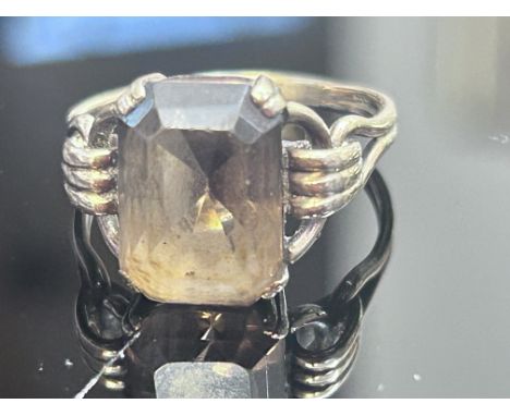 Yellow metal ring set with smokey quartz Weight 3.8g Size O