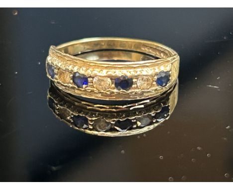 9ct Gold ring set with blue & white sapphires Weight 1.6g Size J 