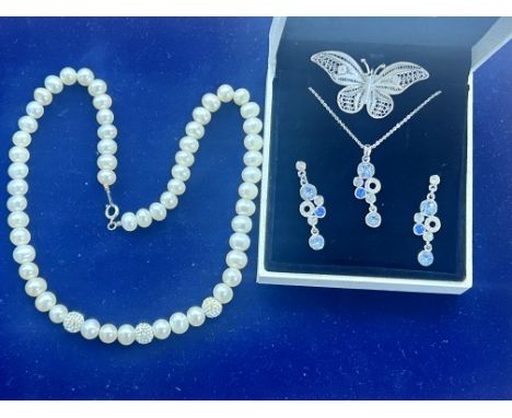 Simulated pearl necklace with silver clasp(possibly Swarovski), Necklace & earring set together with a silver brooch