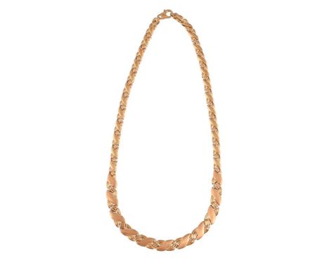 
	
		A GRADUATED FANCY LINK COLLAR NECKLACE 
		The reeded and textured crossover panels with reeded diamond shaped links betw