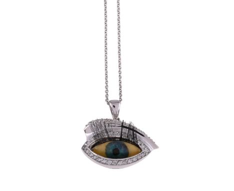 
	
		A DIAMOND SET EYE PENDANT  
		The swivel eye within a diamond set surround and a pav&#233; set diamond brow, the polishe