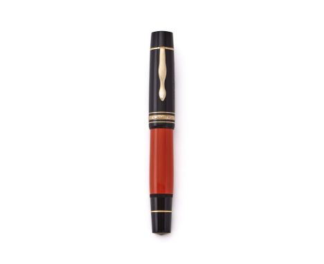 
	
		MONTBLANC, WRITERS EDITION, ERNEST HEMINGWAY
		A LIMITED EDITION FOUNTAIN PEN, 1992
		Cap and Barrel: Orange resin barre
