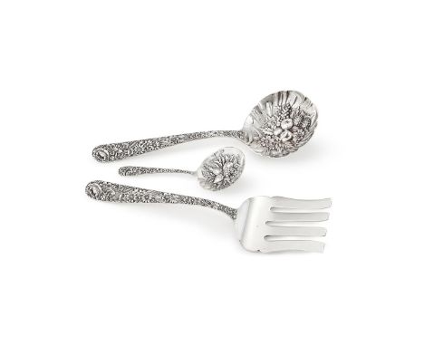 
	
		A SET OF THREE AMERICAN SILVER SERVING PIECES
		S. KIRK &amp; SON, BALTIMORE, CIRCA 1880
		With chased floral handles
		