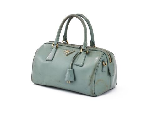 
	
		Y&nbsp;PRADA, SAFFIANO, A COATED GREY LEATHER HANDBAG  
		With twin loop handles and removable shoulder strap, gold tone