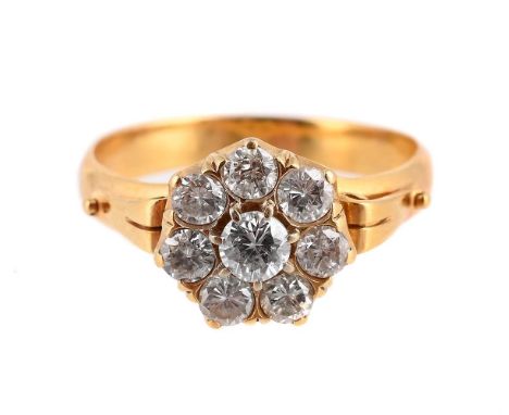 
	
		A DIAMOND CLUSTER RING 
		The brilliant cut diamond cluster, approximately 0.55 carats total, to scrolled shoulders and 
