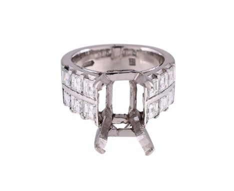 
	
		A DIAMOND SET RING MOUNT 
		The broad setting with step cut diamonds, approximately 1.80 carats total, with a vacant cla