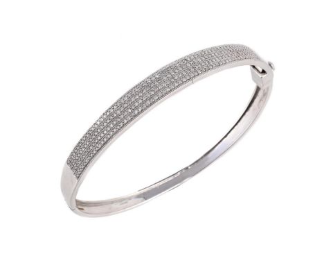 
	
		A 9 CARAT GOLD DIAMOND SET HINGED BANGLE 
		The front section pav&#233; set with single cut diamonds, with UK hallmark
	