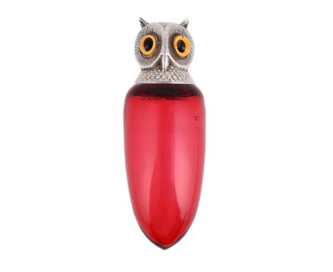 
	
		A VICTORIAN SILVER MOUNTED AND RED GLASS OWL SCENT BOTTLE
		SAMPSON MORDAN &amp; CO., LONDON 1894
		With glass eyes
		8.