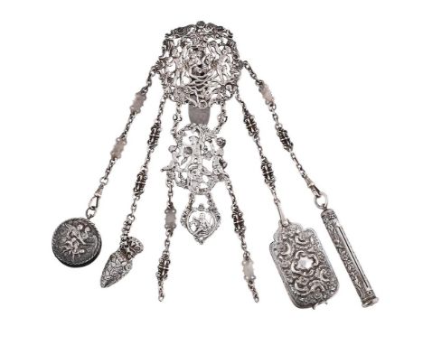 
	
		A VICTORIAN SILVER CHATELAINE
		DAVID &amp; LIONEL SPIERS, BIRMINGHAM 1888
		Pierced and chased with putti among grape v