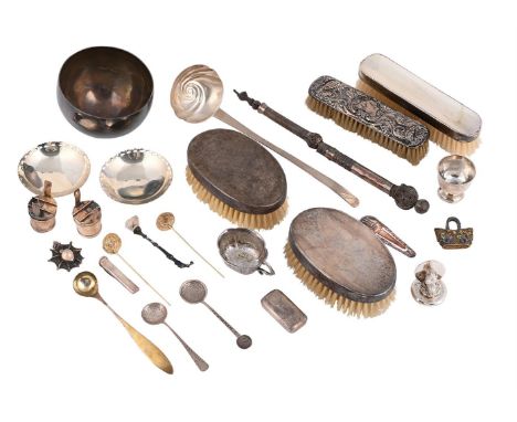 
	
		A COLLECTION OF SILVER ITEMS
		To include: three silver mounted dressing table brushes by Asprey &amp; Co. Ltd., London 