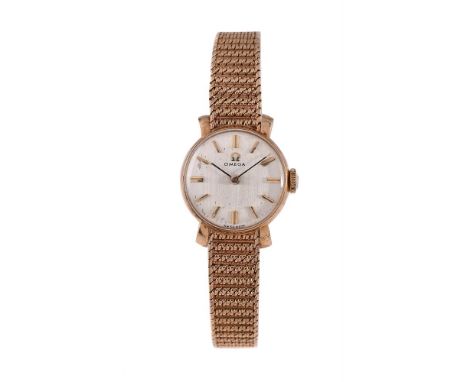 
	
		OMEGA
		A LADY&#39;S 9 CARAT GOLD BRACELET WATCH, NO. 950 159883, CIRCA 1961
		Movement: Cal. 245, manual wind, 17 jewel