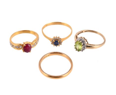 
	
		THREE GEM SET RINGS AND A BAND RING 
		The first a ruby and diamond ring, the central oval cut ruby claw set between bri