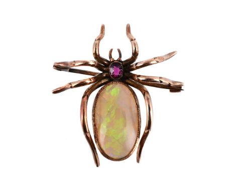 
	
		AN EARLY 20TH CENTURY OPAL AND RUBY SPIDER BROOCH 
		The spider with a cushion cut ruby set thorax and oval cabochon opa