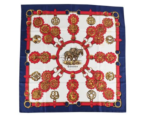 
	
		HERM&#200;S, CUIVRERIES
		A SILK SCARF 
		The cream ground with navy blue border with red and ochre horse brass detail, 