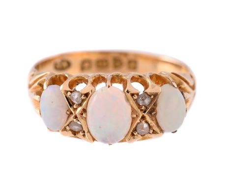 
	
		AN EDWARDIAN OPAL AND DIAMOND RING 
		CHESTER 1908 
		The three graduated oval cabochon opals with rose cut diamond poin