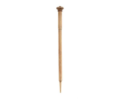 
	
		A GOLD COLOURED PROPELLING PENCIL
		UNMARKED
		With engine turned decoration and foliate chased terminal
		9.5cm long
		