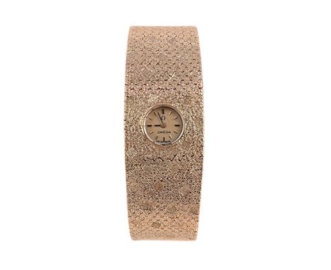 
	
		OMEGA
		A LADY&#39;S 9 CARAT GOLD BRACELET WATCH, CIRCA 1966
		Movement: Manual wind
		Case: 9 carat gold woven textured