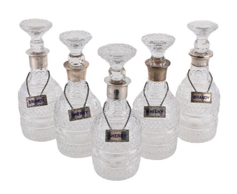 
	
		FIVE MATCHED SILVER MOUNTED DECANTERS
		FOUR BY S. J. ROSE &amp; SON, BIRMINGHAM 1961 (2) AND LONDON 1961 (2), ONE BY HA