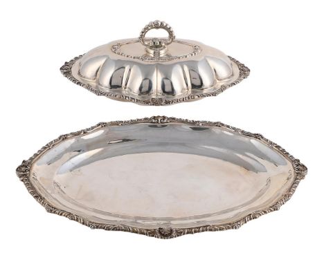 
	
		AN ITALIAN SILVER COLOURED SHAPED OVAL VEGETABLE DISH, COVER AND TRAY
		ALESSANDRIA 1944 - 1968 .800 STANDARD
		With a l