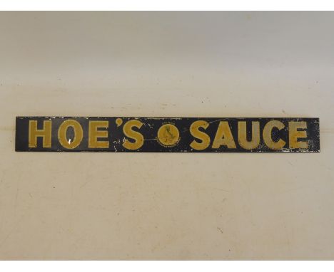 A Hoe's Sauce shelf strip, 14 1/2" long.