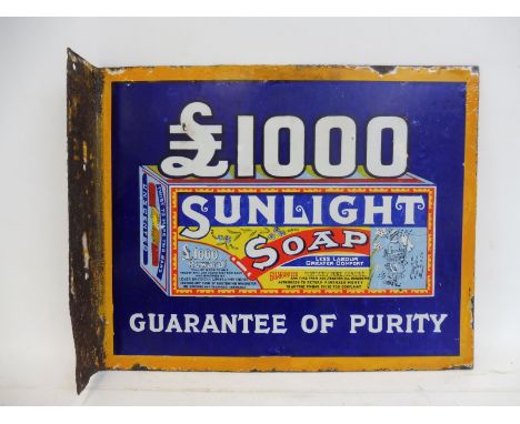 A rare double sided enamel sign with hanging flange advertising to one side Sunlight Soap and Lifebuoy Soap to the other, 15 