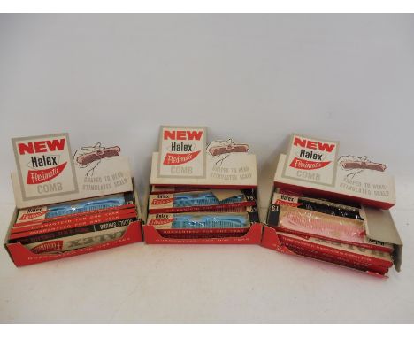 Three Halex Fleximatic Comb counter top dispensing boxes with contents.