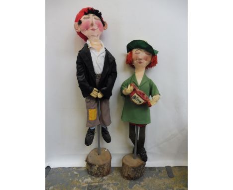 A pair of very unusual Bisto shop window promotional soft toy figures of a man and a lady, each approx. 46" tall including st