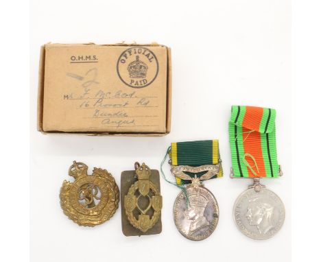 British WWII Territorial Medal to 2075702 SJT F McCord, REME, with McCord's WWII Defence medal and two badges. UK P&amp;P Gro