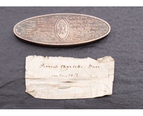 Princess Charlotte (1796-1817) a lock of hair in paper with manuscript inscription 'Princess Charlotte hair undated' containe