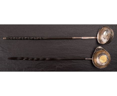 A George III toddy ladle, not marked with George I 1723 coin inset and spiral whalebone handle, with a similar George III tod