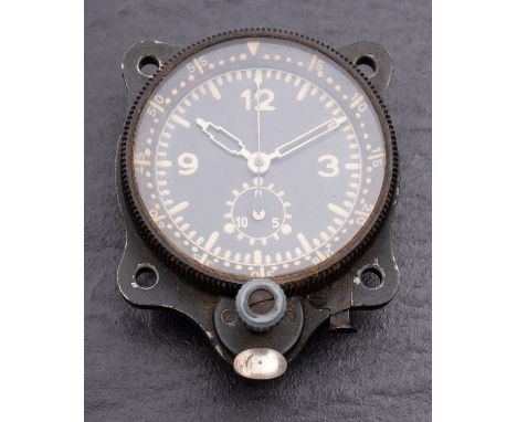 A WW2 Luftwaffe cockpit clock, possibly Junghans, with luminous hands and dial, the movement stamped J30BZ1, 7.5 cm high