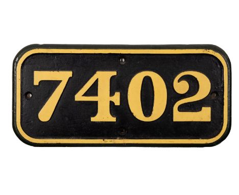 A replica brass engine plate '7402', 30cm by 64.5cm