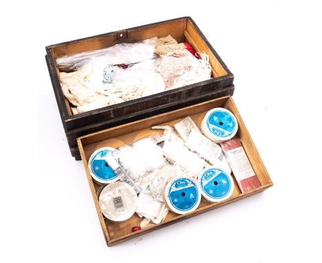 A collection of miscellaneous lace trim and edging in an associated wooden trunk, the trunk 22x42x27cm