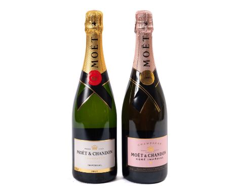 Two bottles of vintage champagne together with two bottles of Moet & Chandon