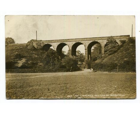 An album containing approximately 213 postcards, including photographic postcards titled 'British Memorial-Menin Gate', 'Arch