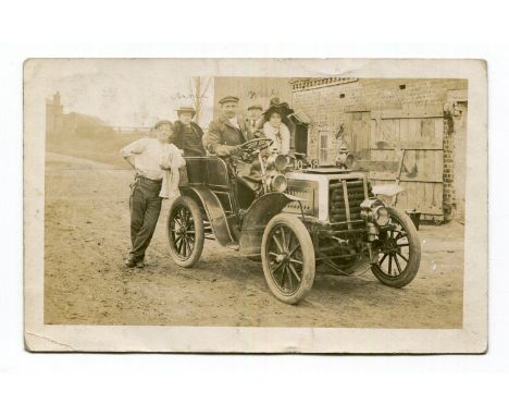 DARRACQ. An album containing approximately 140 postcards and photographs of Darracq motorcars, including views of cars outsid