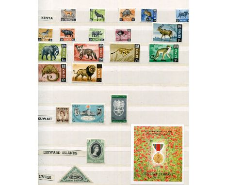 A collection of world mint stamps in five albums, including Ascension 1956 to 10 shillings, Australia, Gibraltar sets to £5, 
