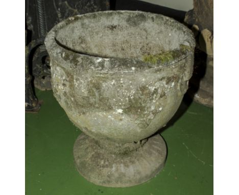 A reconstituted stone garden urn 50cm high x 45cm wide