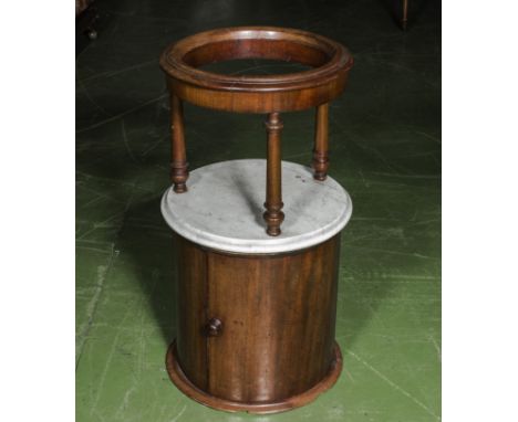 A Victorian pot cupboard with marble top and basin holder above